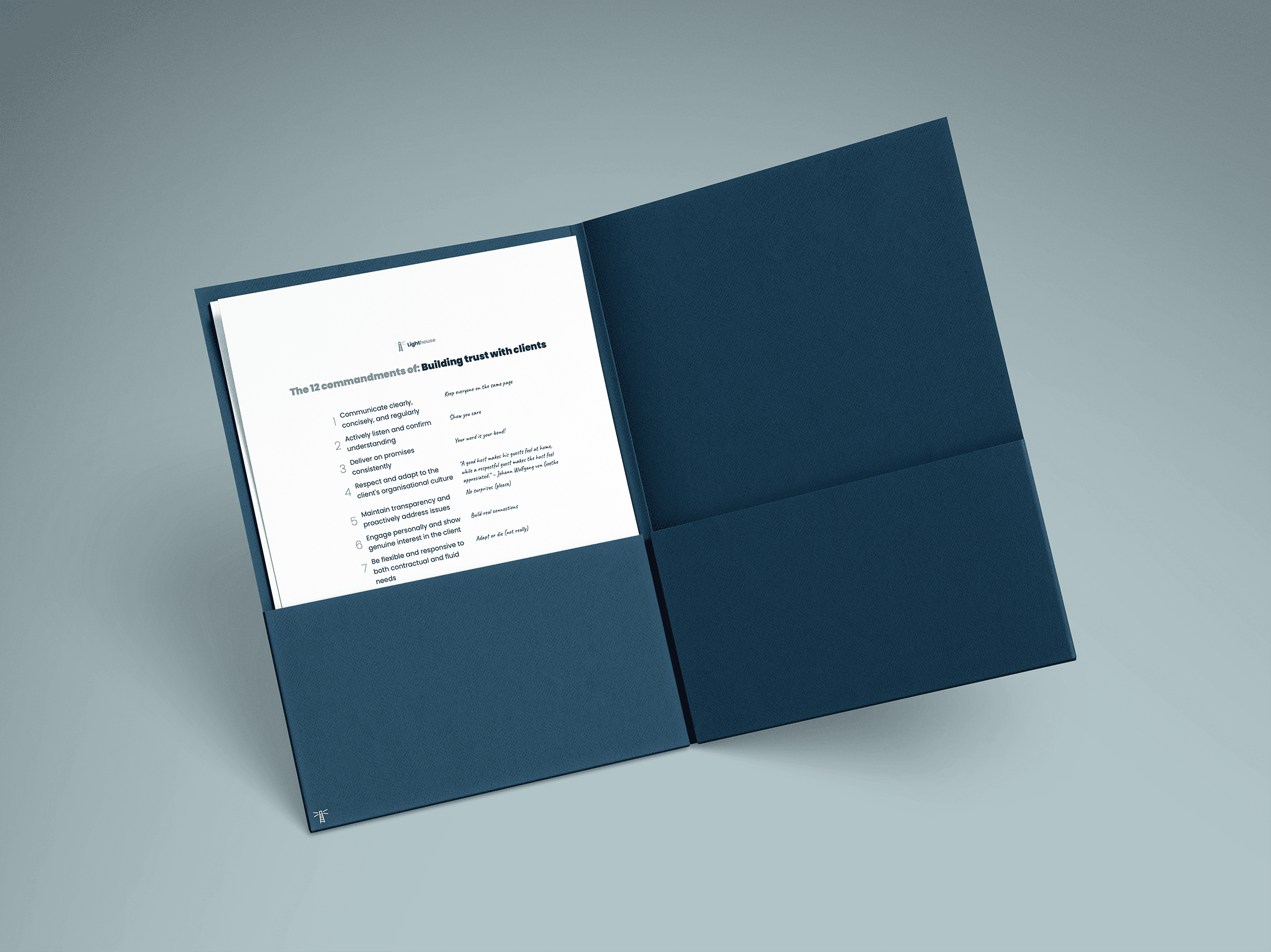 A Lighthouse folder open on a printed guide titled “The 12 commandments of building trust with clients”.